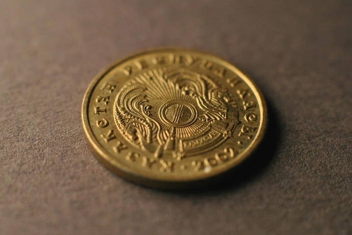 A close up of a coin on a table
